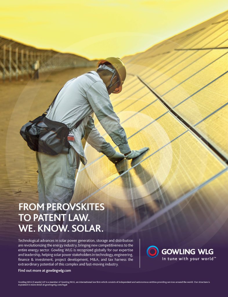 A man taking care of a large solar panel at a solar farm. caption: from perovskites to patent law, we know solar.