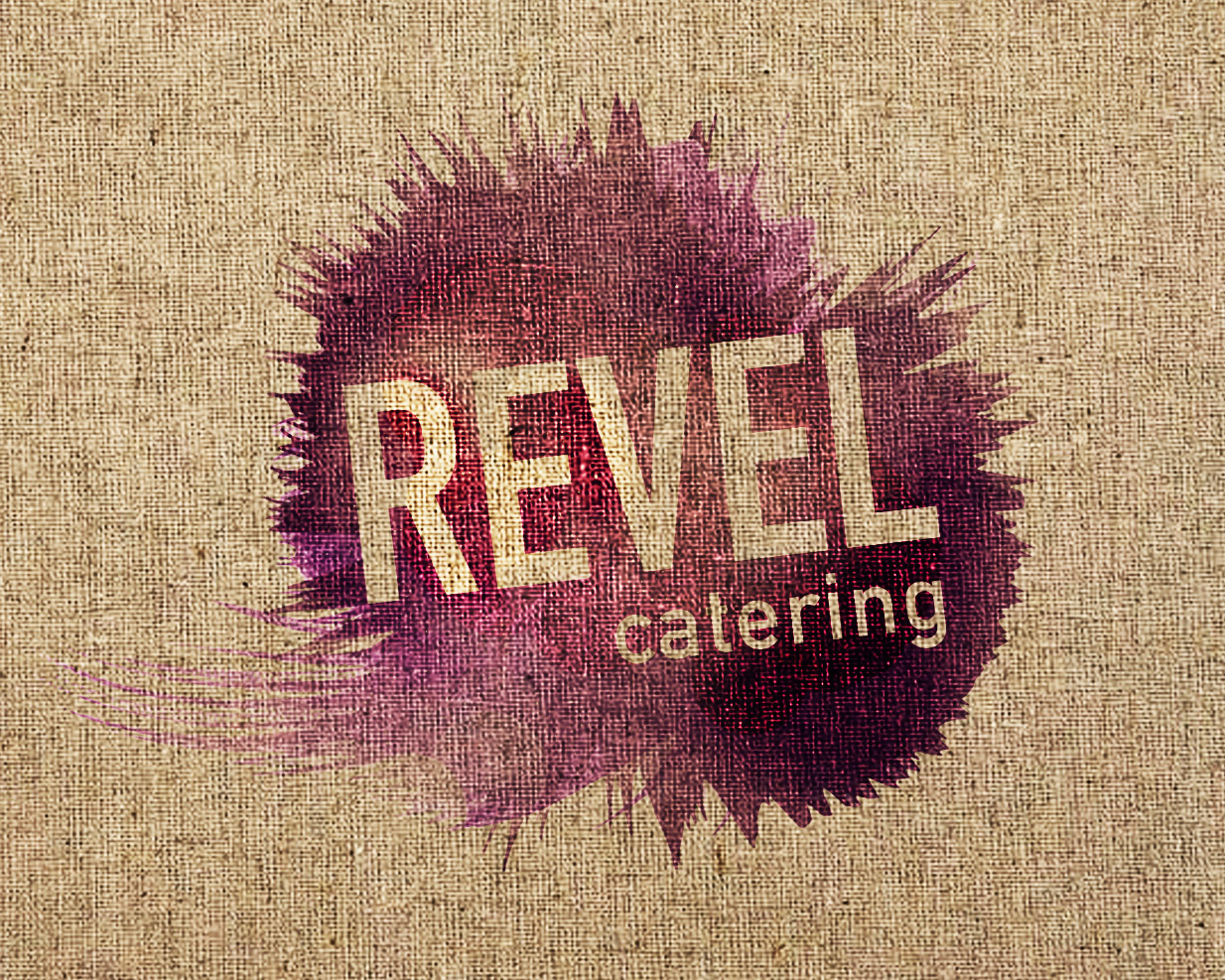 The Revel logo, which is wine smudge with the words 'Revel Catering' inside of it