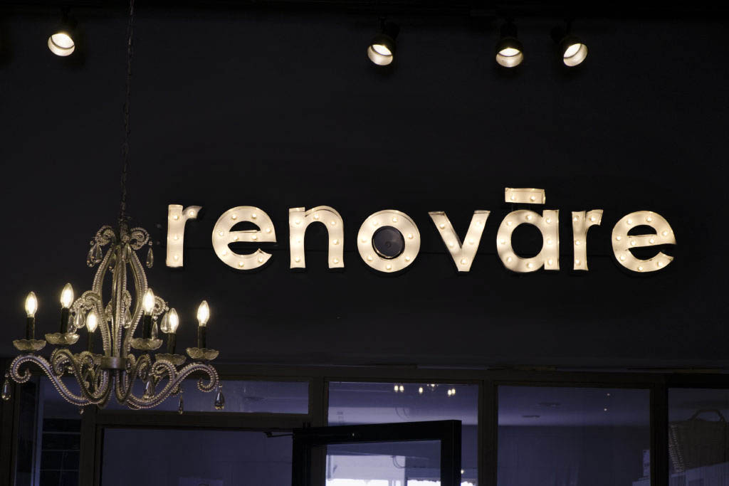 an illuminated sign about 5 feet long and 1 foot tall that reads renovare