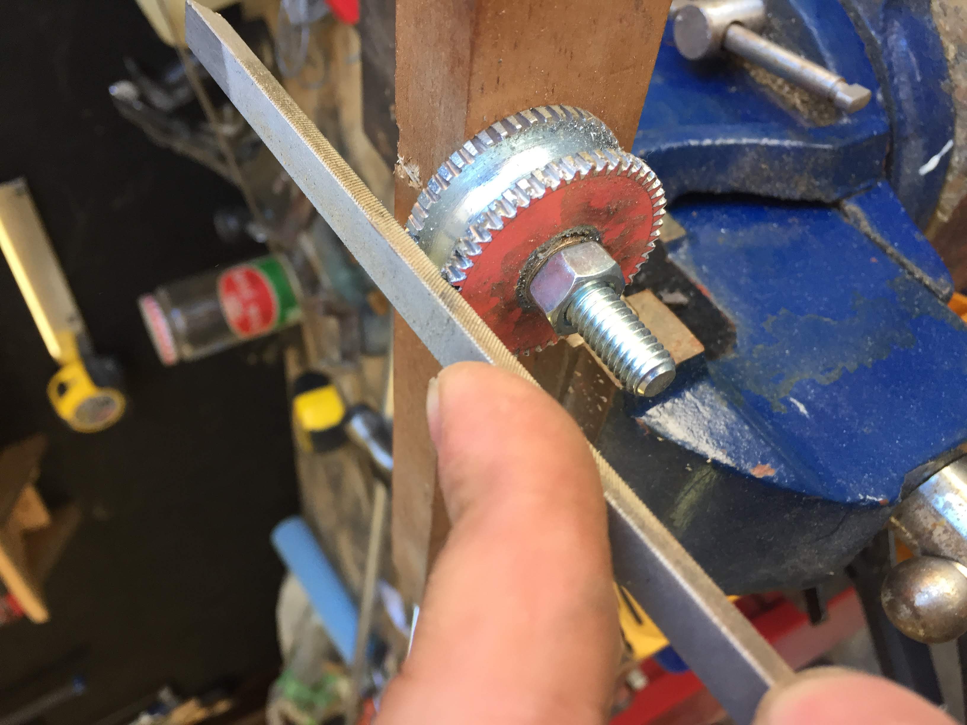 teeth being refined with a file